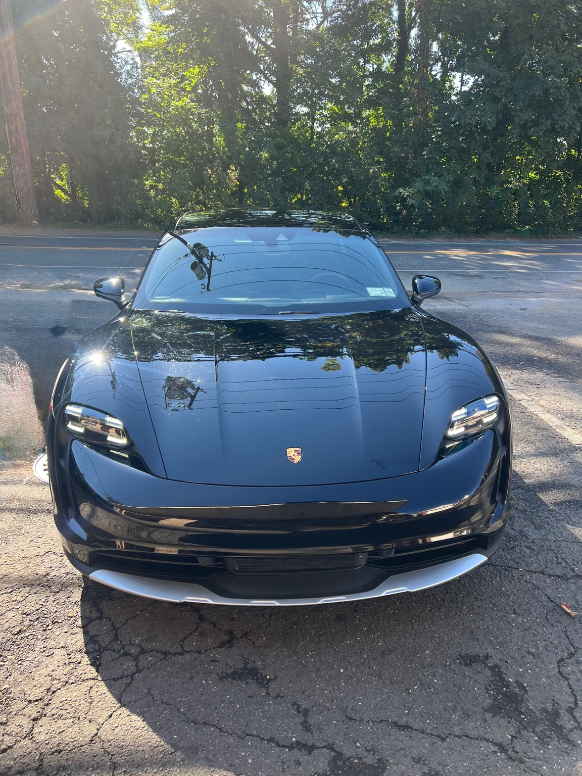 Black Porsche with restored paint finish at Professional Car Detailing in Locust Valley, NY
