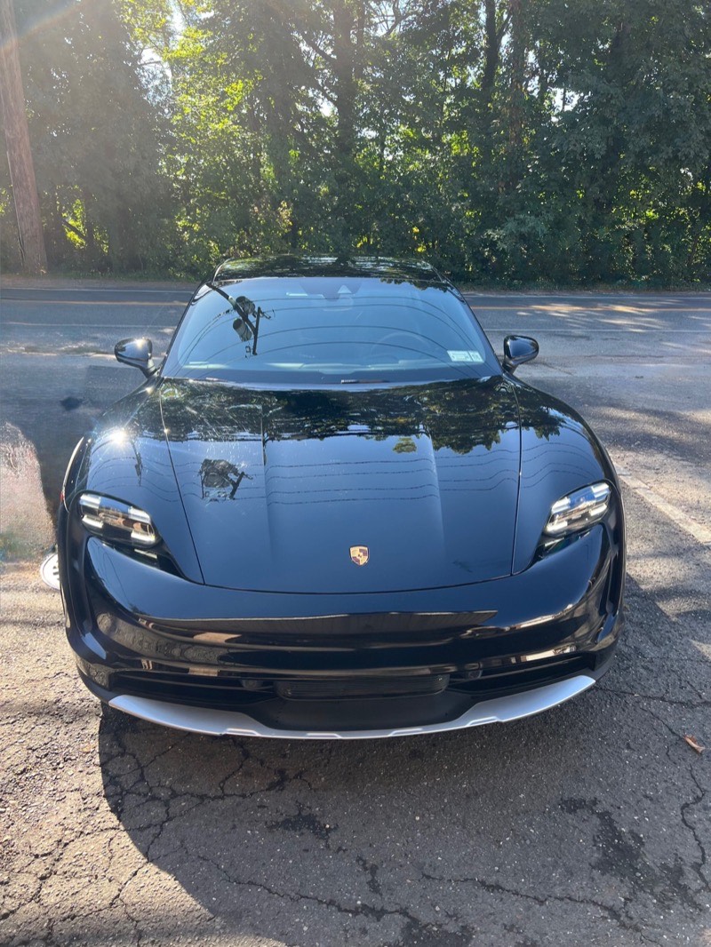Ceramic coated Porsche showcasing deep gloss and hydrophobic protection at Professional Car Detailing in Locust Valley, NY