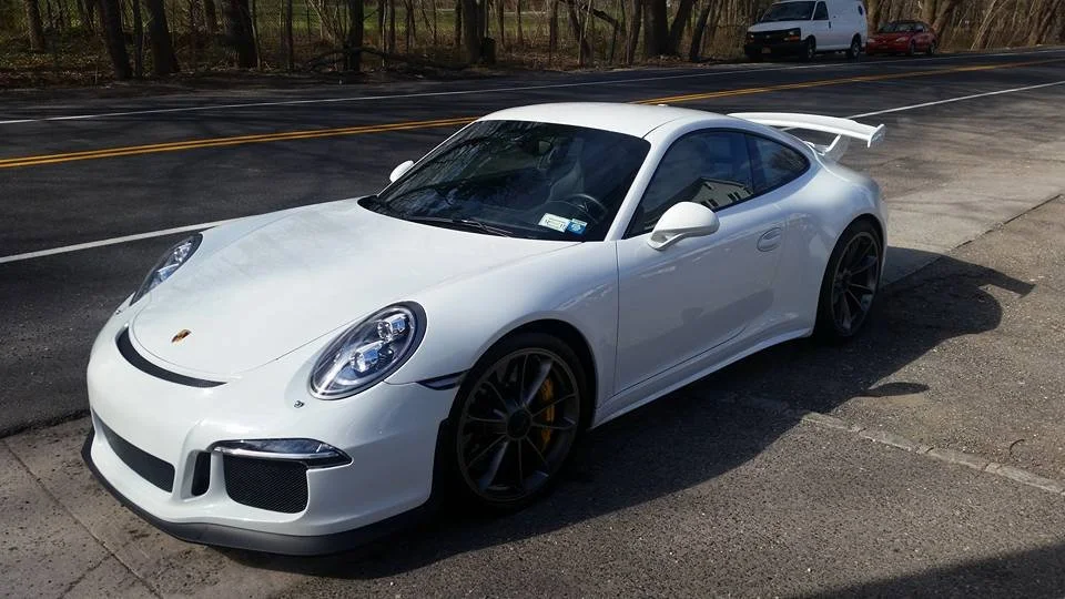 White Porsche with paint protection film installed at Professional Car Detailing in Locust Valley, NY